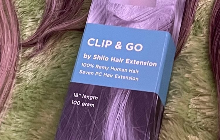 Clip on human hair extensions