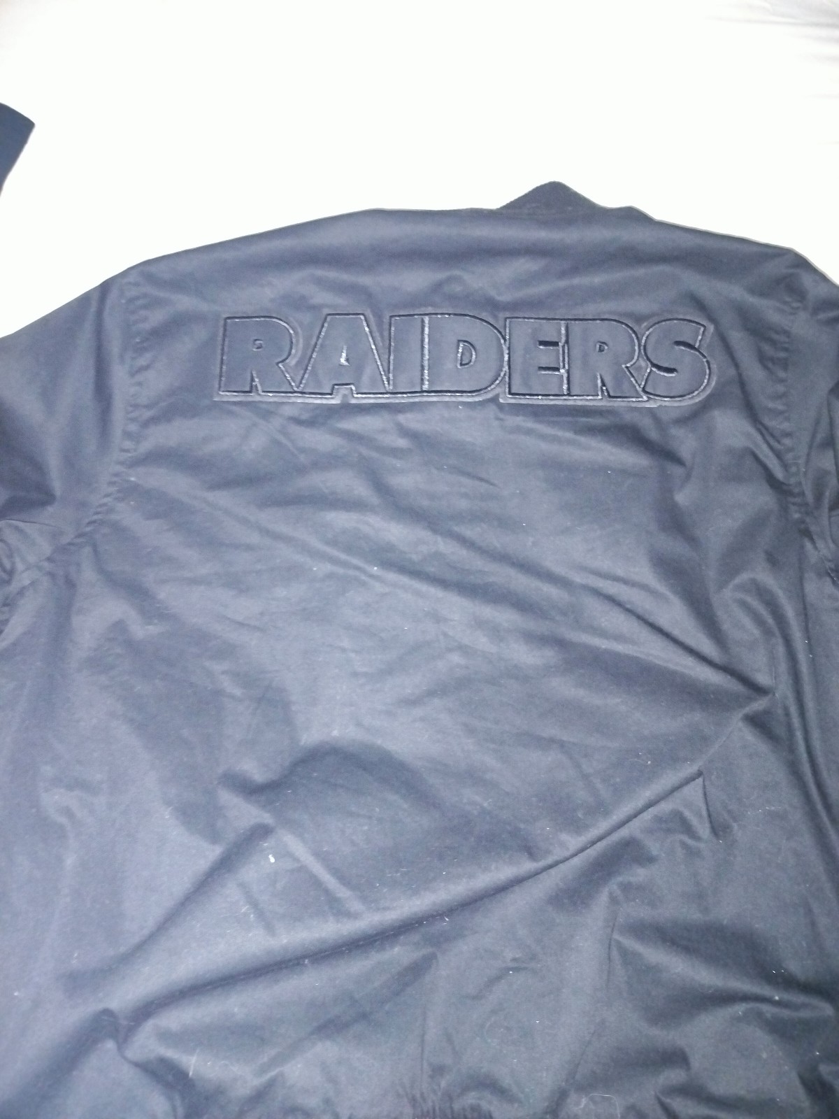 Men's large Raiders bomber jacket black on black