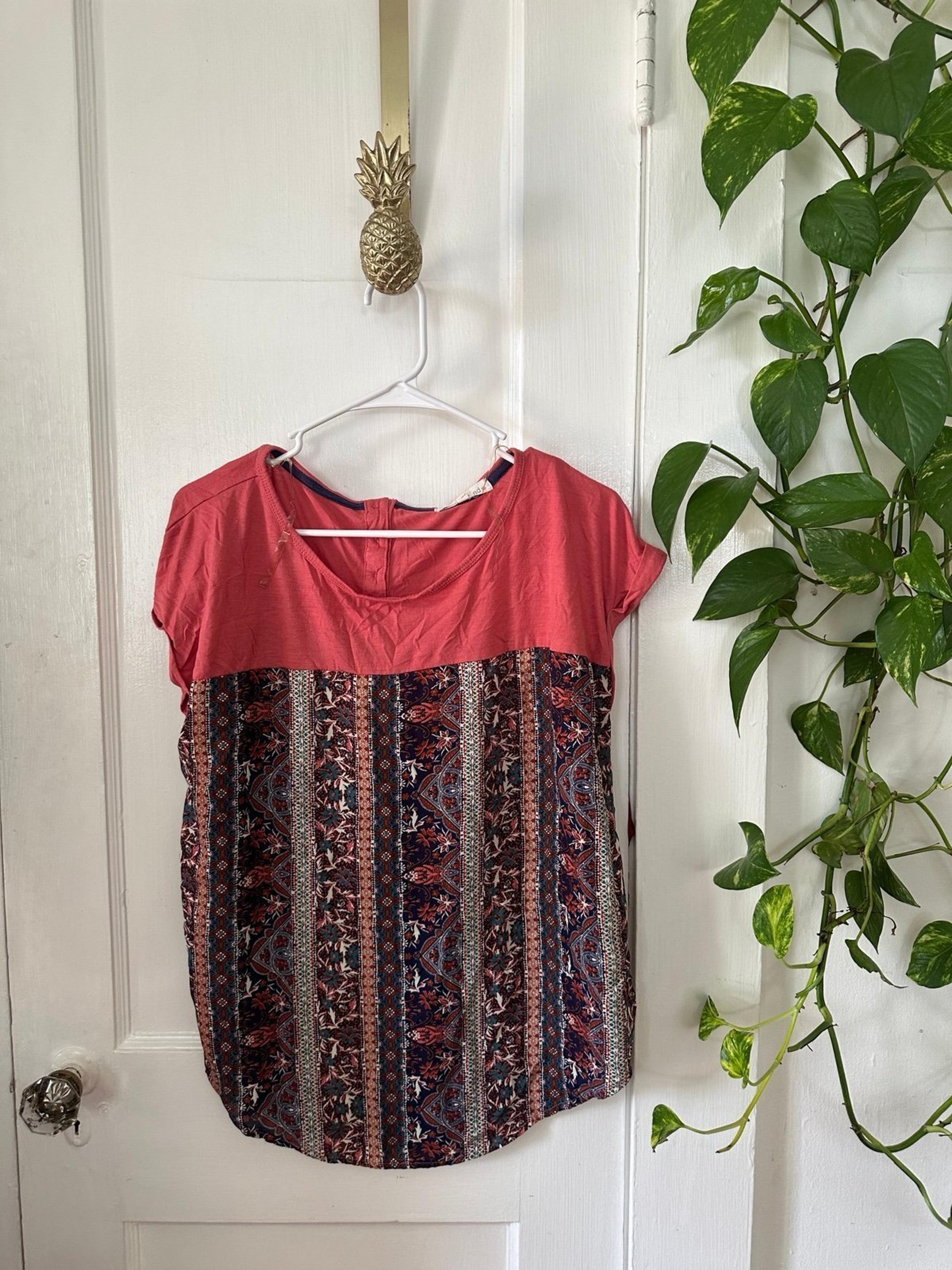 Rewind Women’s size large pink design blouse