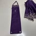 A Saint Laurent parasol with elegant purple and silver embroidery.