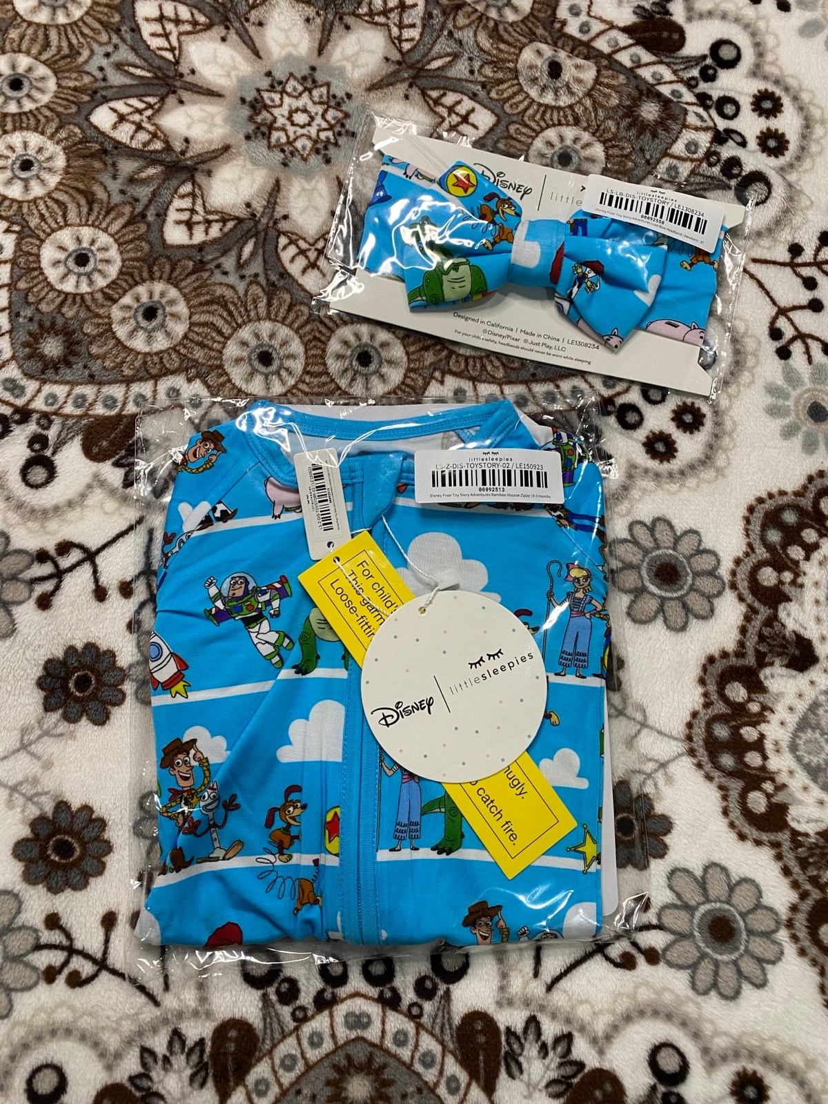 Little sleepies 0-3 Toy Story zippy and bow