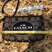 Coach F51783 Large Logo black and white , holds an iphone! wristlet Excellent Co