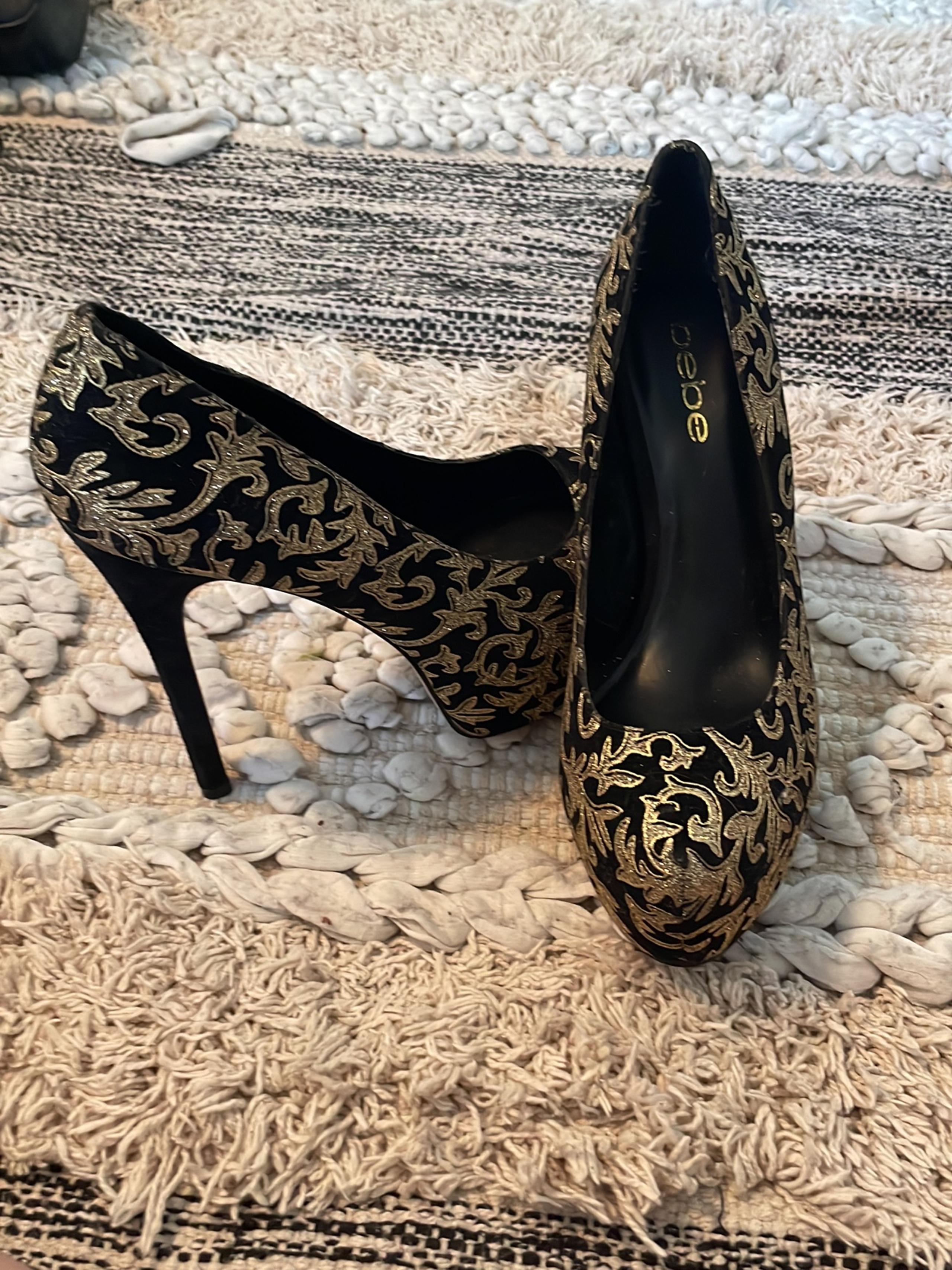 Bebe black stiletto high heels gold appliqué