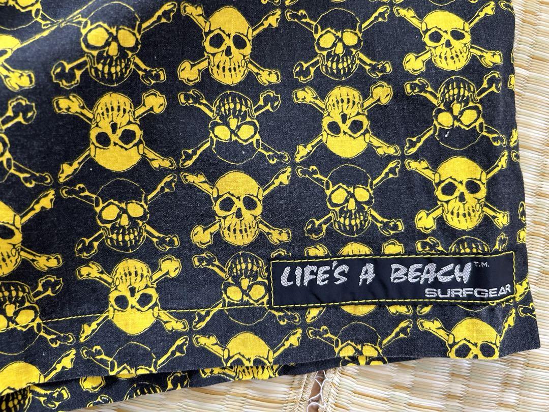 In the 1980s, life's a beach punk skull shorts. Casual shorts