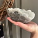 White flower apophyllite on basalt cutbase