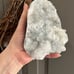 White flower apophyllite on basalt cutbase