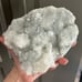White flower apophyllite on basalt cutbase