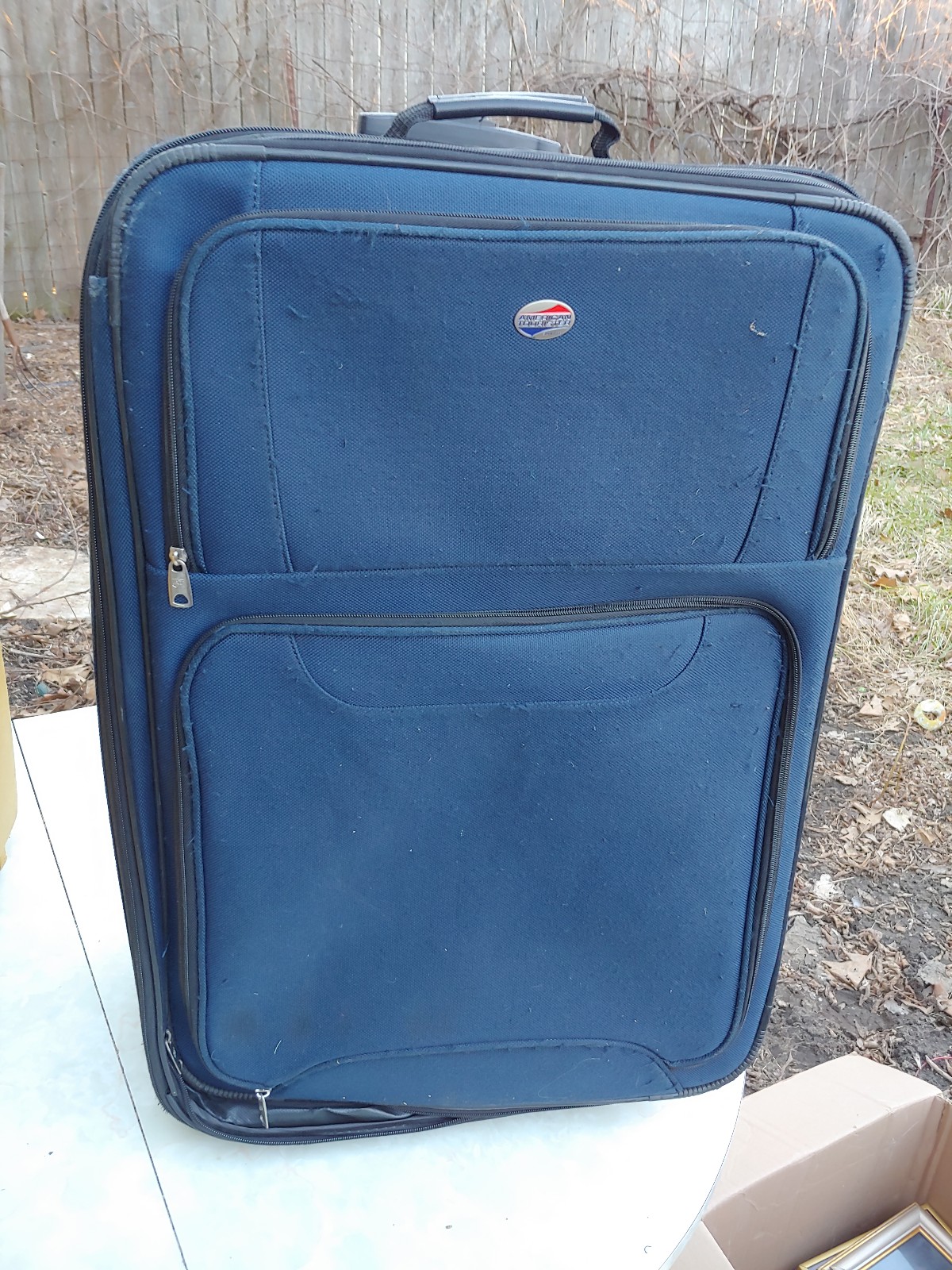 American tourist blue large size rolling luggage with handle
