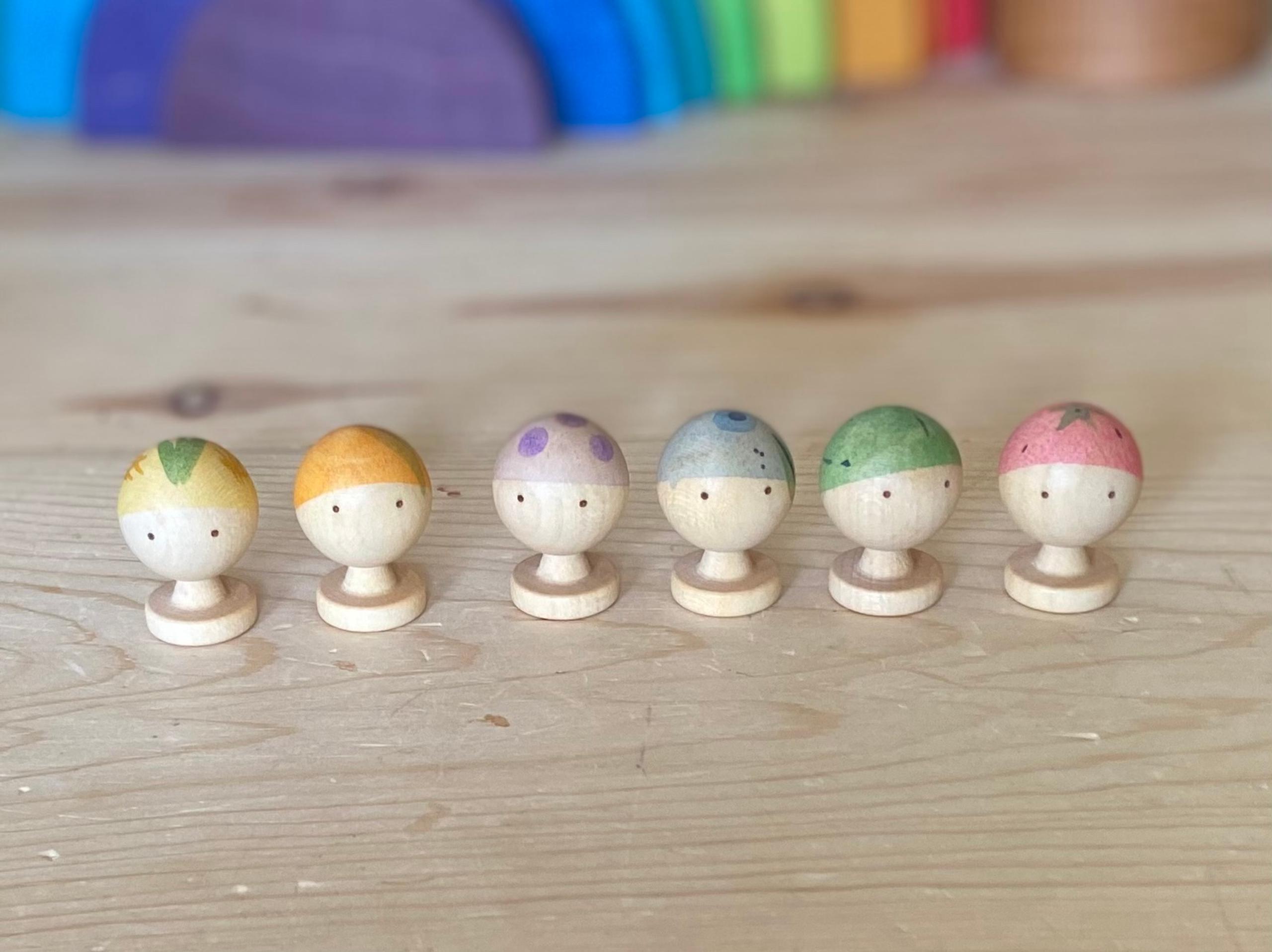 Grapat fruit doll heads