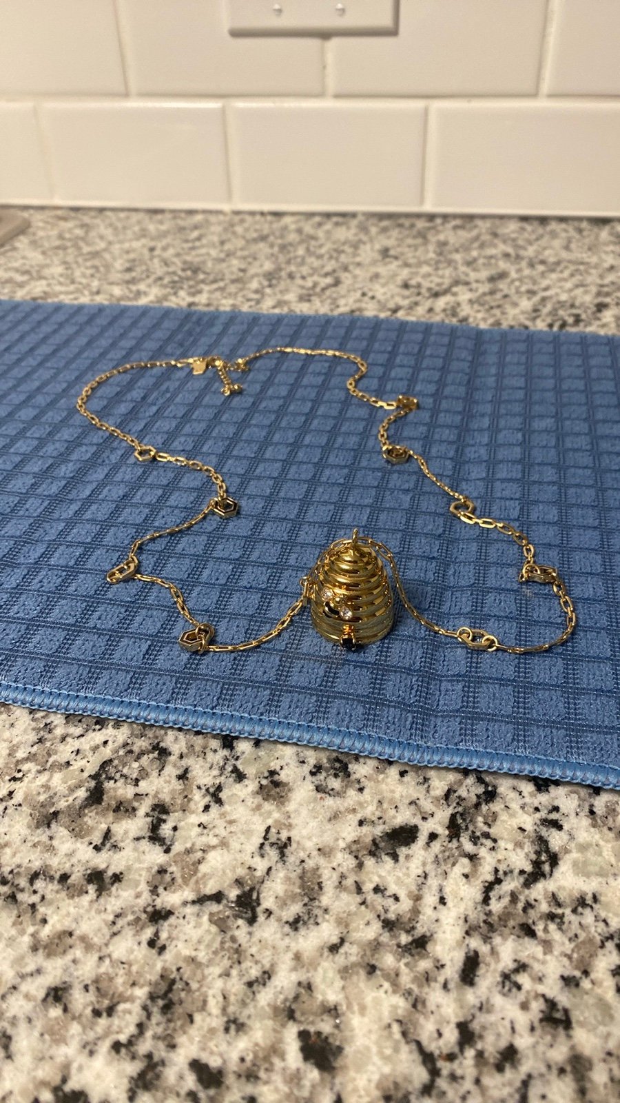 Kate Spade queen, beehive necklace