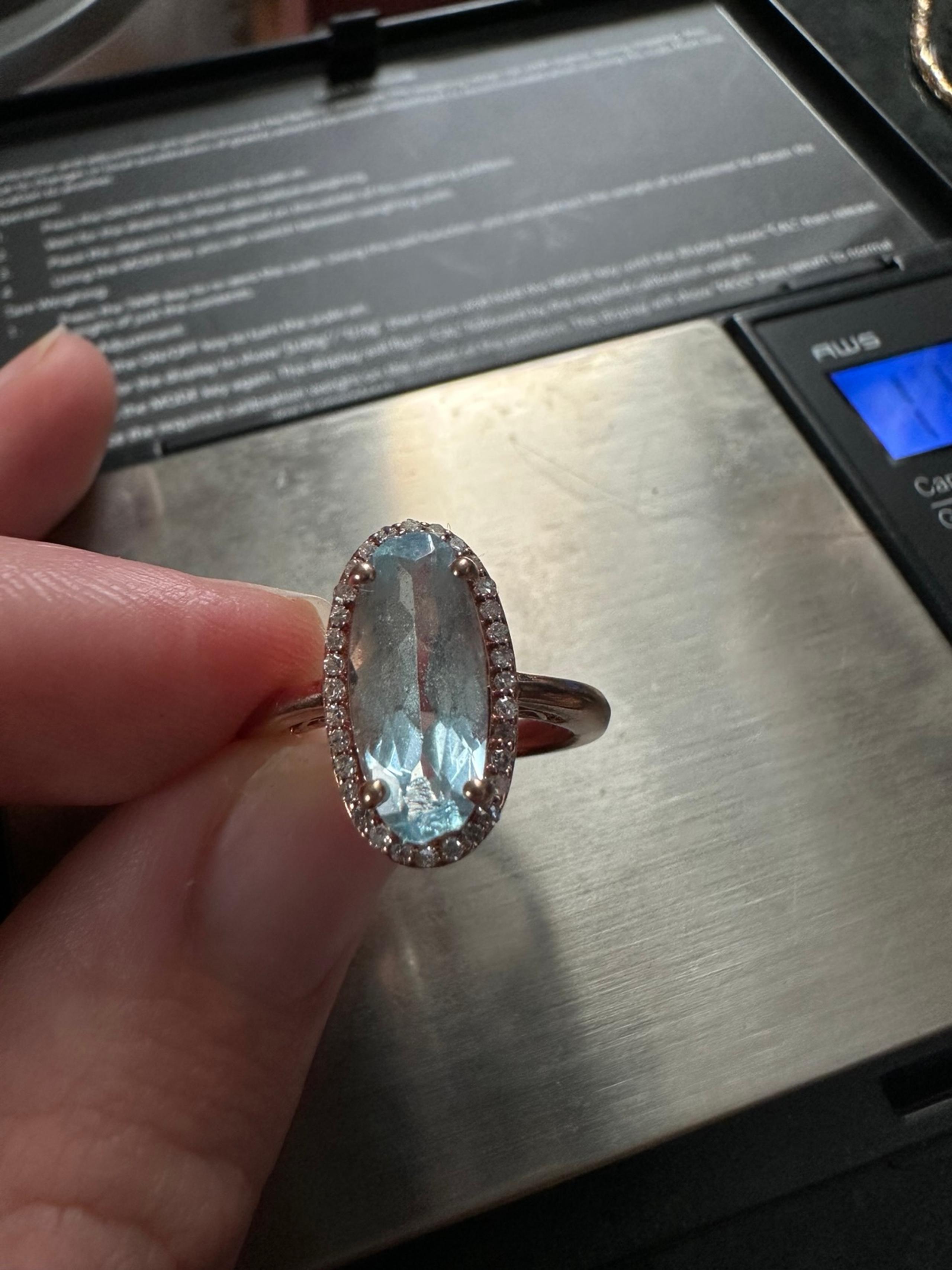 10k aquamarine diamond ring