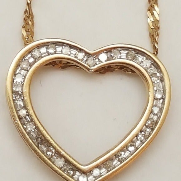 Estate Vintage 10k gold .50ct diamond pendant