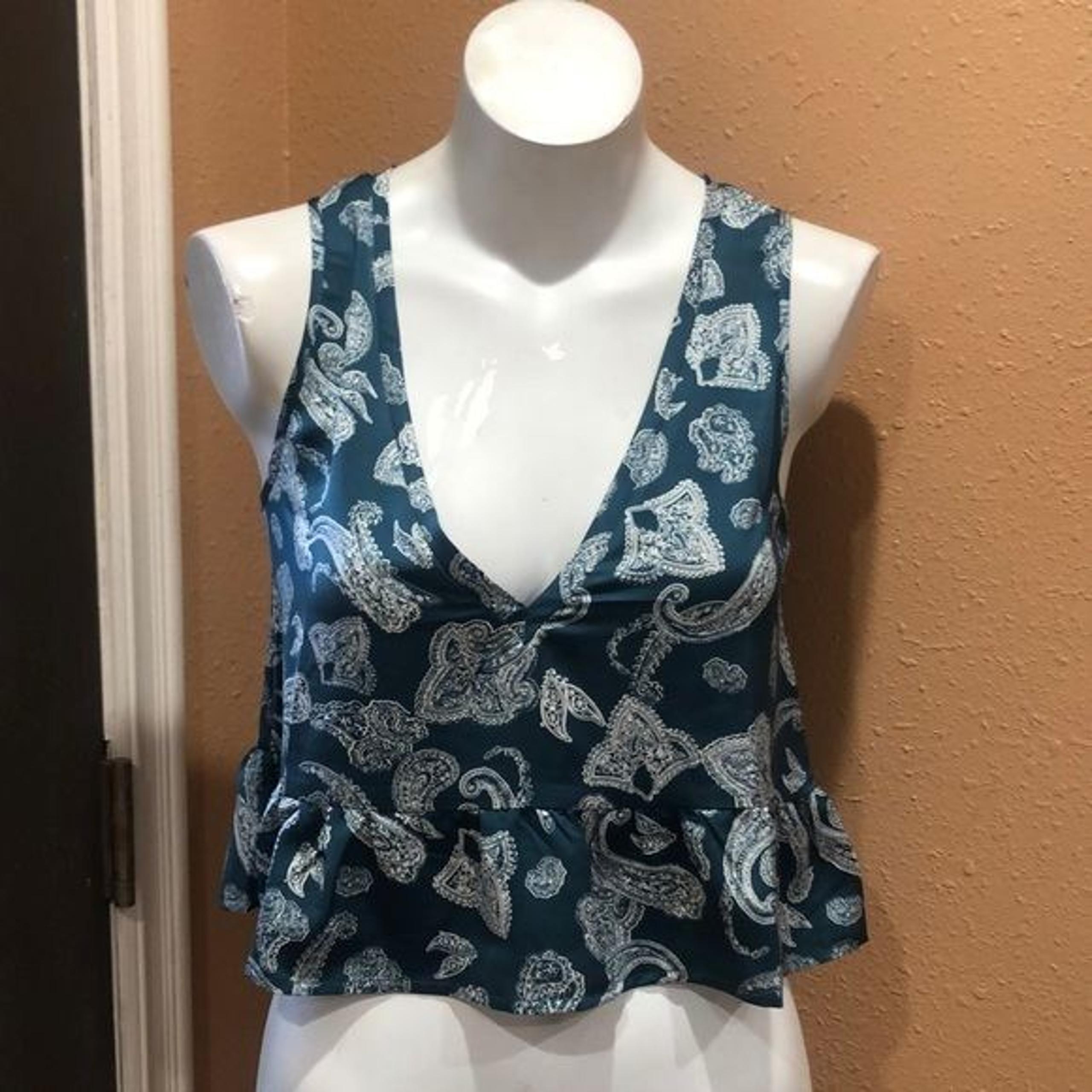 Honey punch blue patterned v neck ruffled blouse