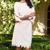 NWT. Ming Wang Floral Lace Hem Knit Sheath Dress Whisper Pink Size XS. Fits siz