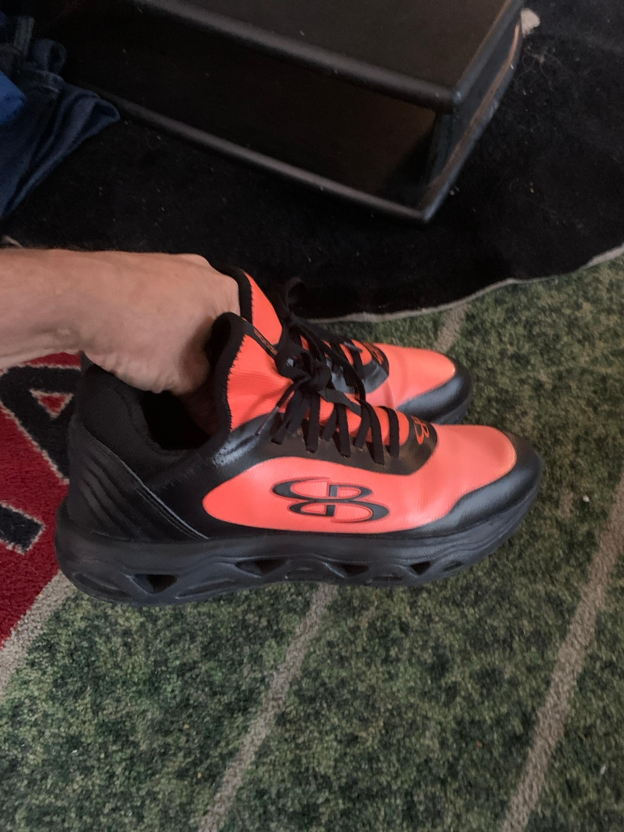 Boombah men’s orange/ blacks shoes size 10