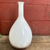 Tall white art glass vase with brown splatter 17”