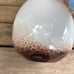 Tall white art glass vase with brown splatter 17”