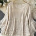 Crochet hollowed out two-piece women's sweet trumpet sleeve sweater