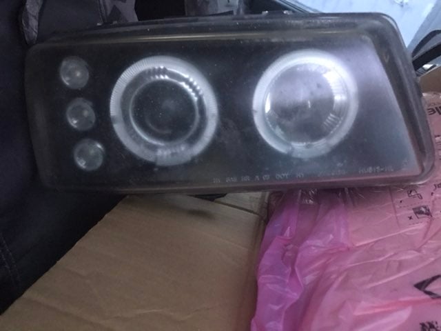 Chevy 04 cat Eye :2 halo headlight housi