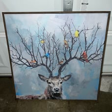 Framed painted canvas