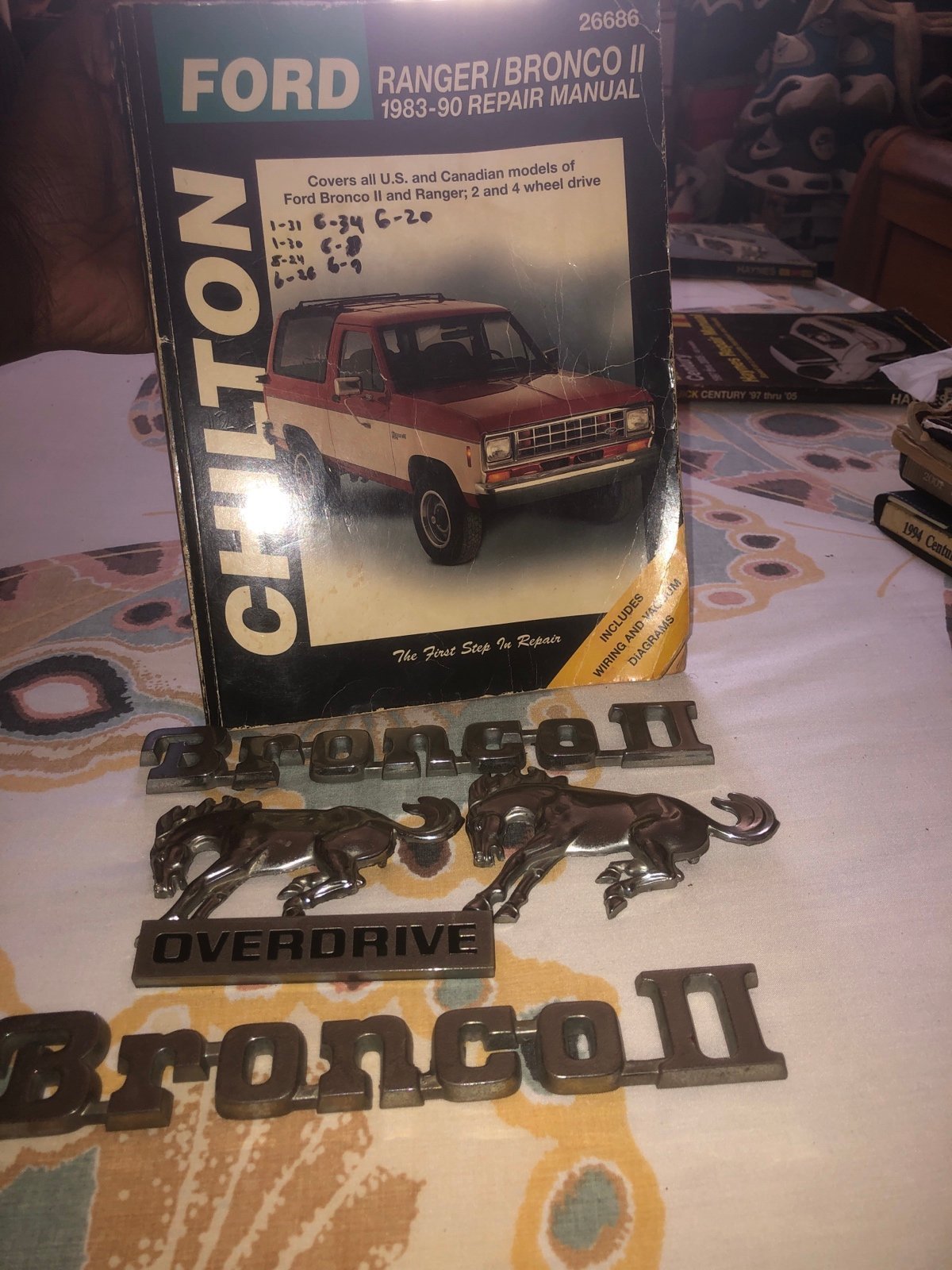 1985 BRONCO 2 CHROME RARE EMBLEMS & RARE REPAIR BOOK