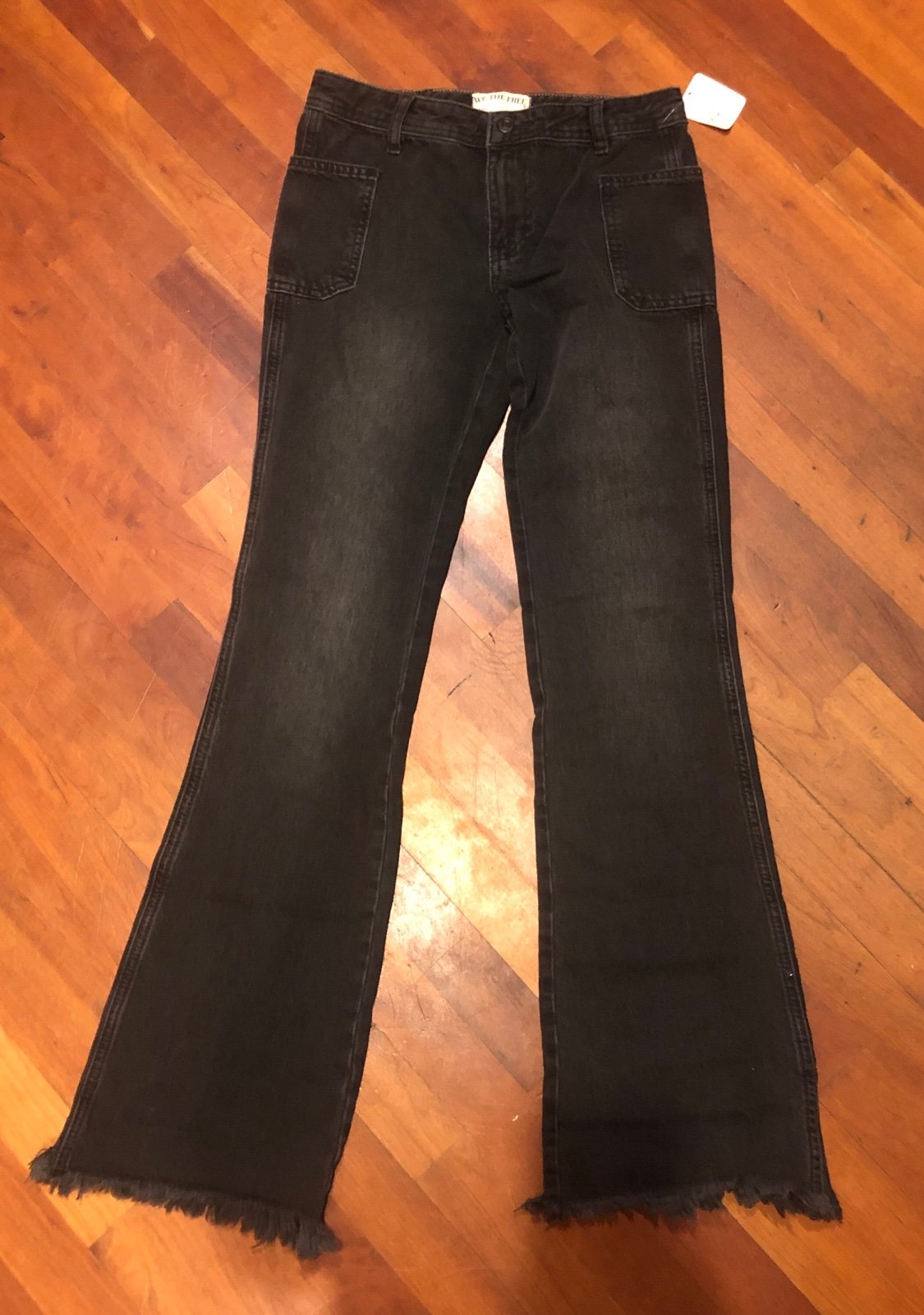 Free People We the Free Izzy Flare Leg Raw Hem Jeans Size 24.