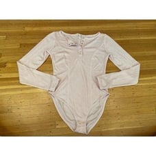 Intimately Free People long sleeve light pink Henley Sloan bodysuit.