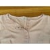 Intimately Free People long sleeve light pink Henley Sloan bodysuit.