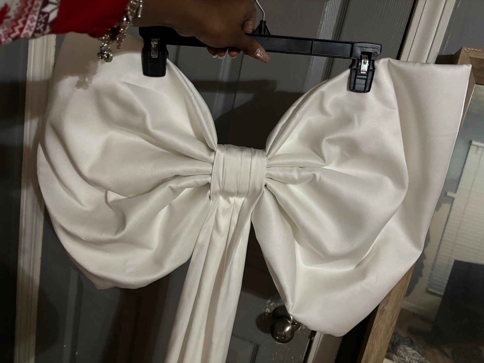 Oversized bow with train