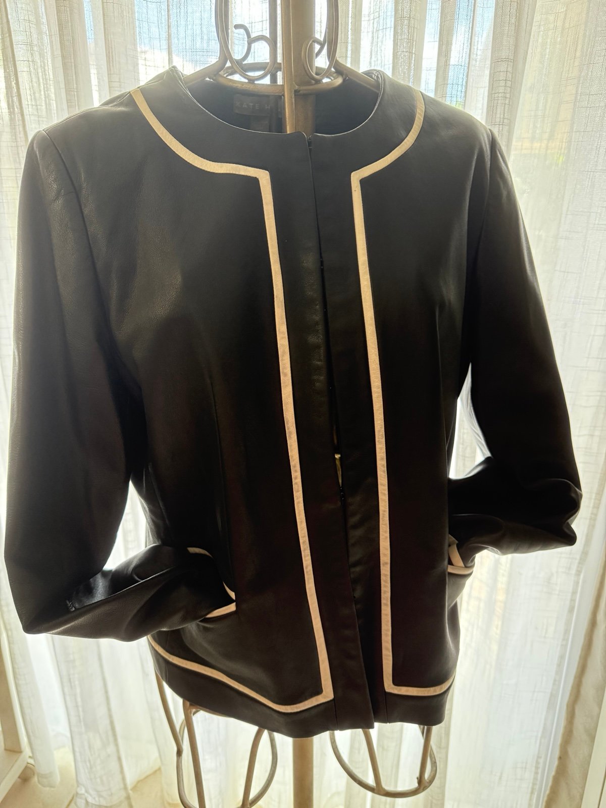 100% Genuine Leather Black Blazer with white trim.