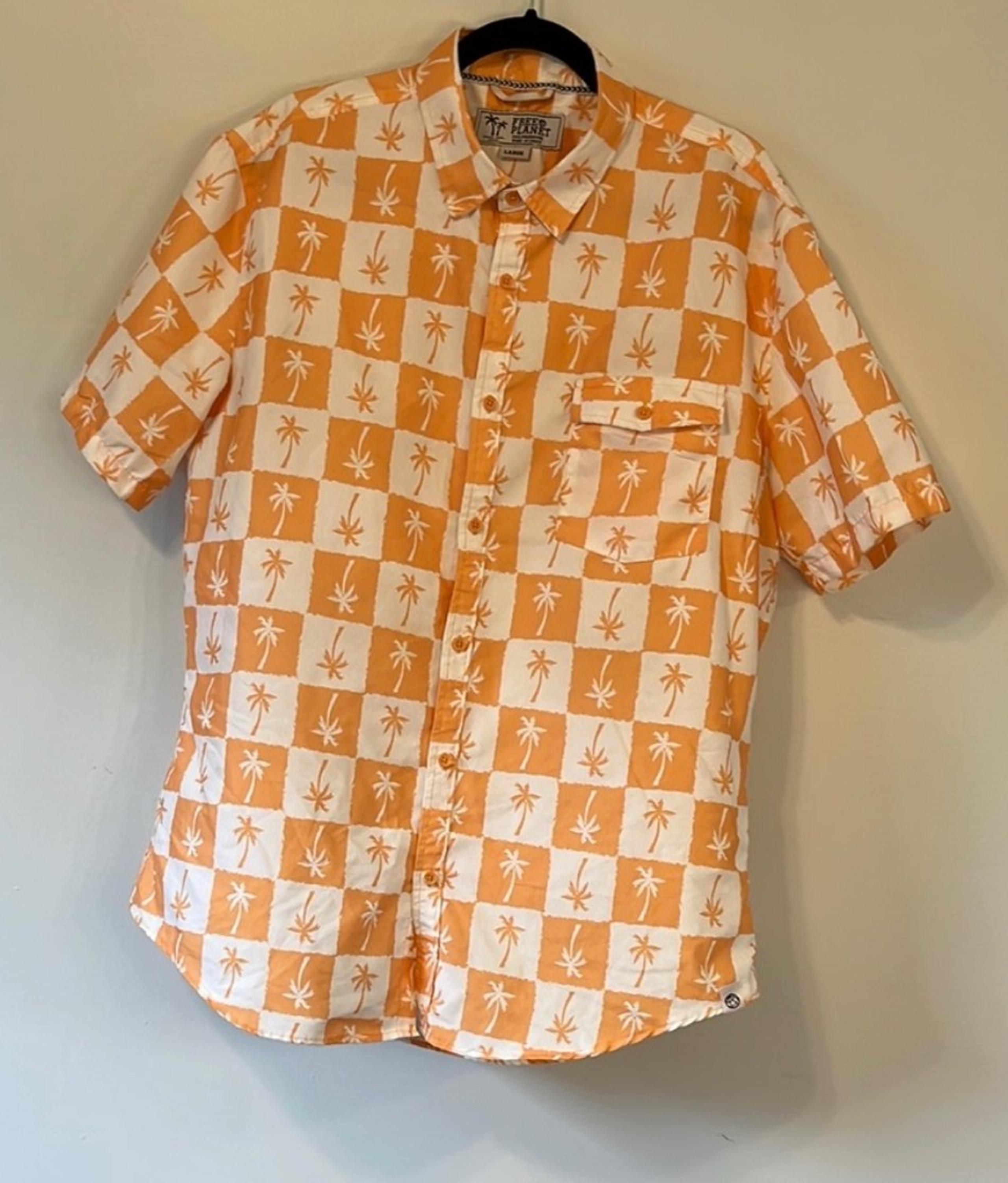 Free  Planet Orange and White Shirt