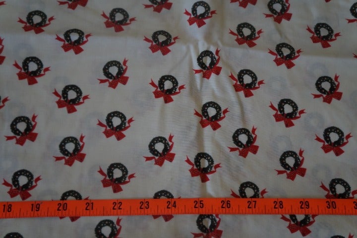 Wreaths on Light Yellow Christmas Fabric
