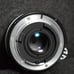 Nikon 24mm f/2.8 Nikkor Single Focus Lens with Crab Claw (referring to the lens hood)