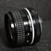 Nikon 24mm f/2.8 Nikkor Single Focus Lens with Crab Claw (referring to the lens hood)
