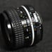 Nikon 24mm f/2.8 Nikkor Single Focus Lens with Crab Claw (referring to the lens hood)