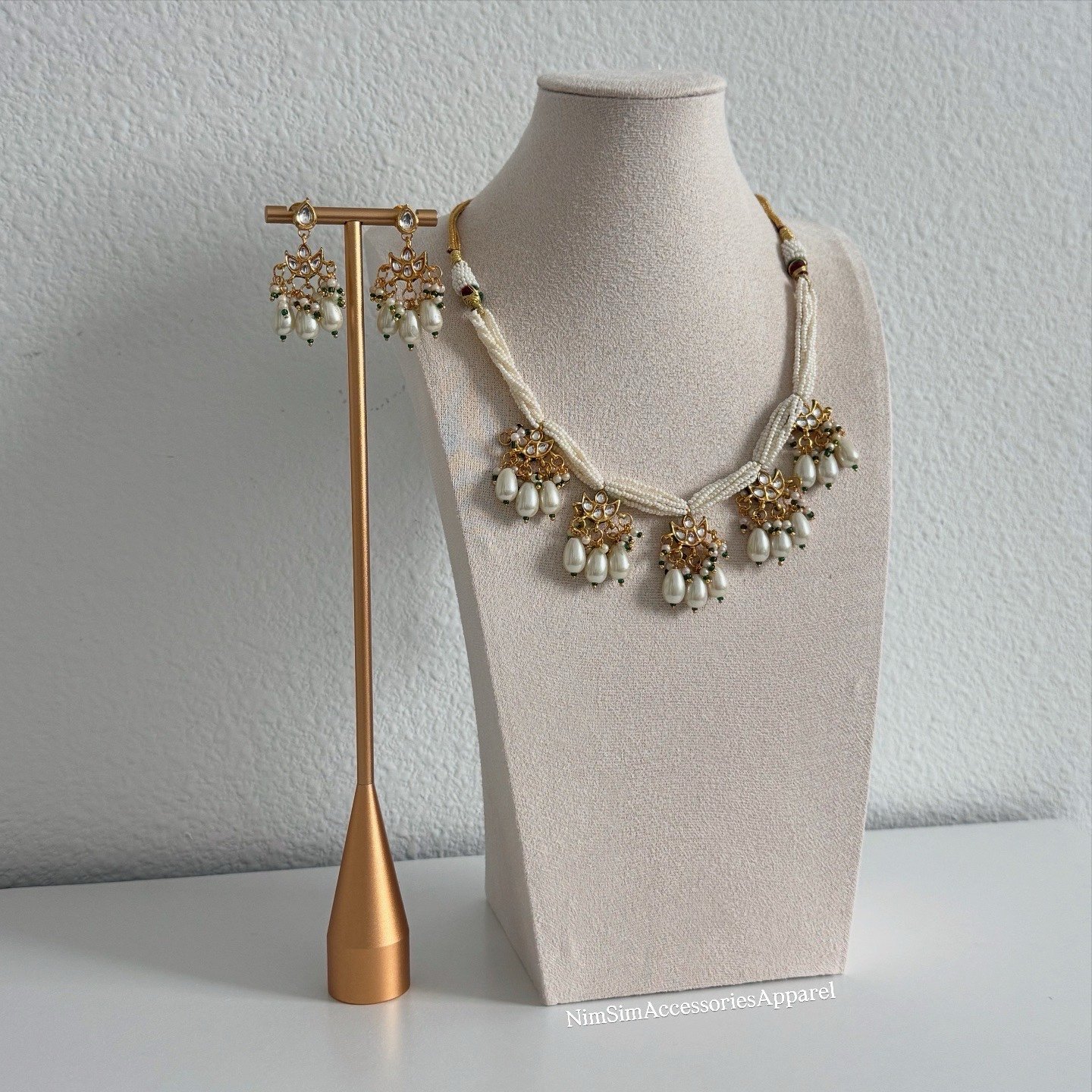 white necklace with earrings