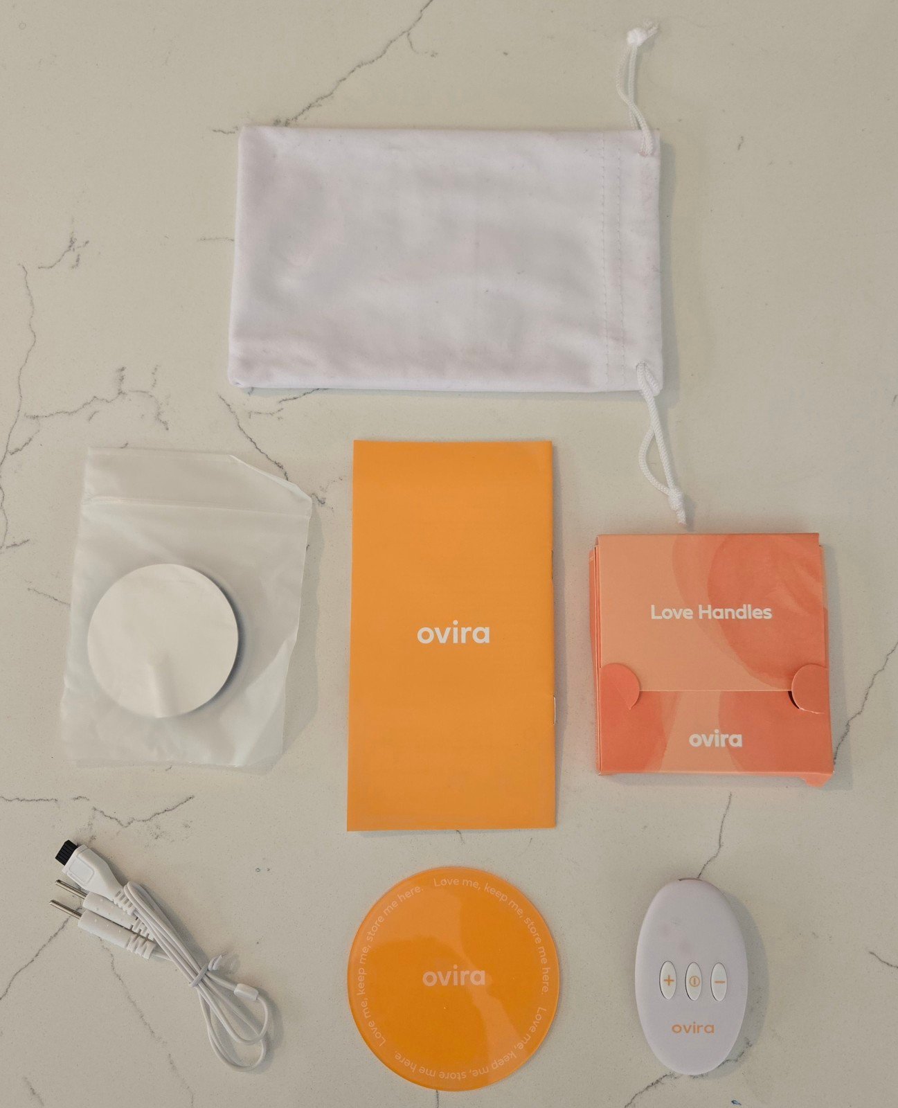 Ovira Period Cramp Relief Hand Held Clipped Device