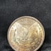 L@@K 1884-O MORGAN SILVER DOLLAR (TONED)