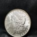 L@@K 1884-O MORGAN SILVER DOLLAR (TONED)
