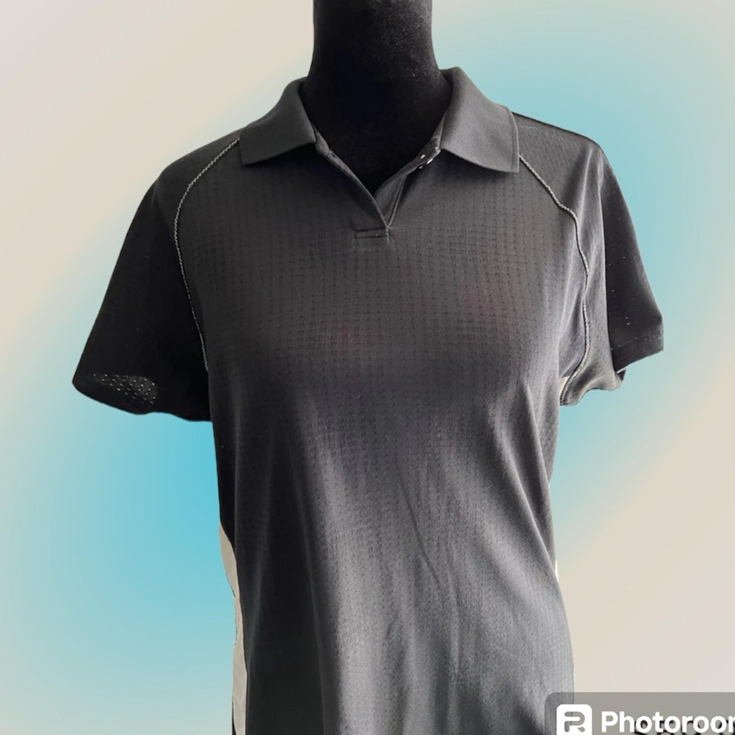 Antigua women’s size M, Desert Dry Golf shirt, black
