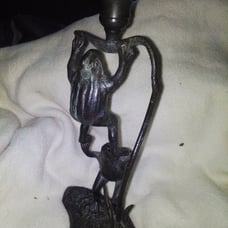 Verdigris bronze frog candlestick holder