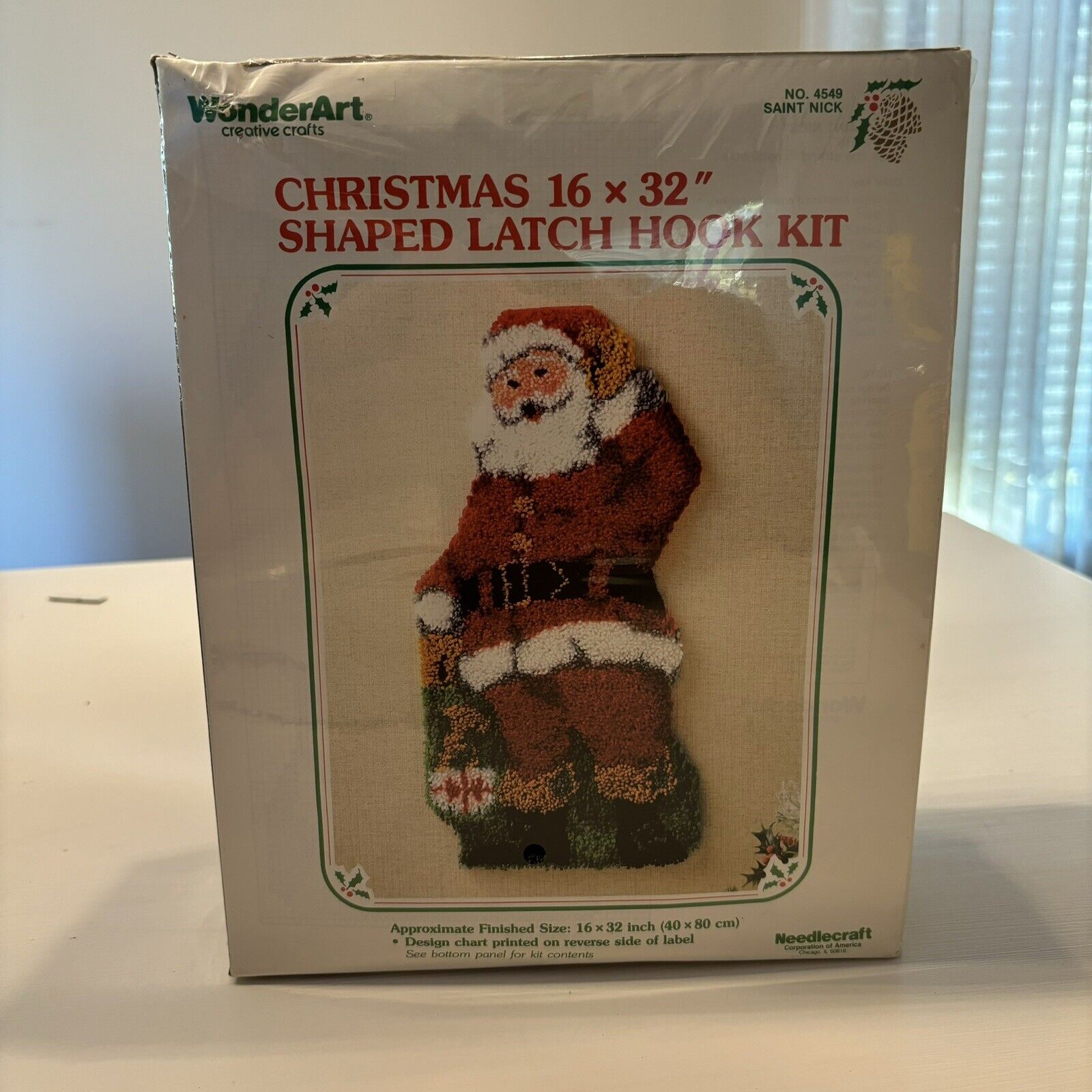 Needlecraft Christmas 16 Inch x 32 Inch Shaped Latch Hook Kit Saint Nick #4549