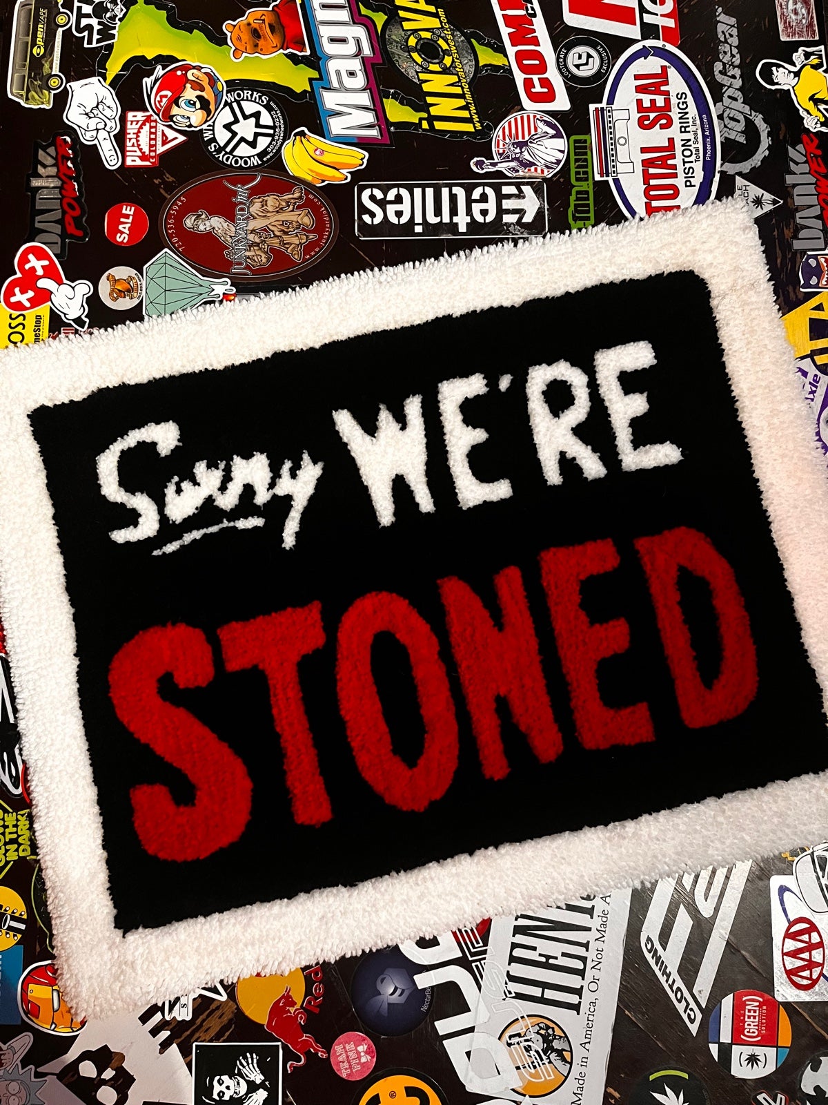 Custom tufted rug “were stoned”