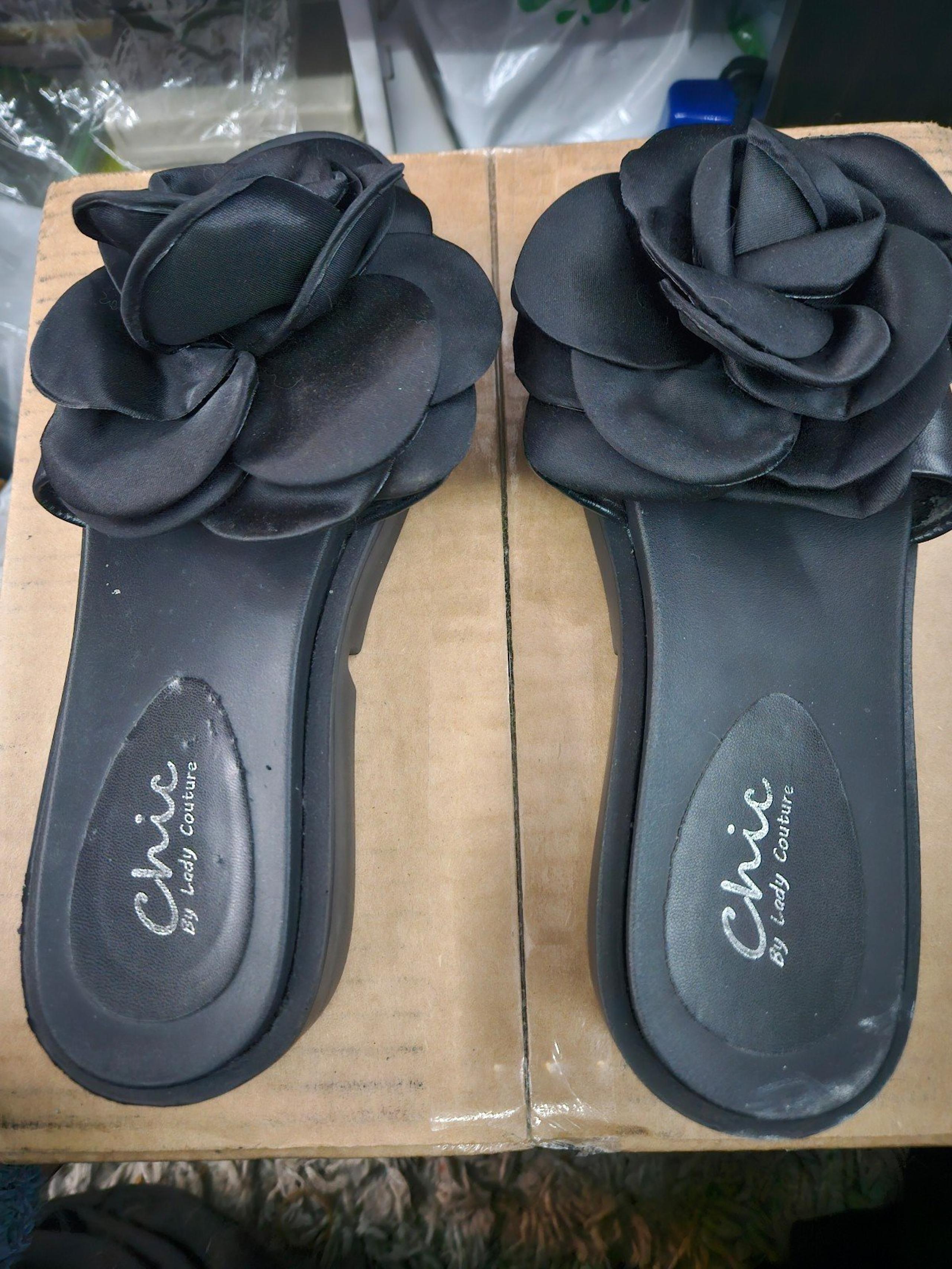 Black flowered sandals