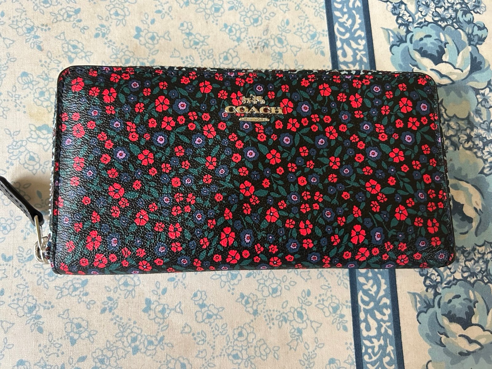 Coach floral zip around accordion wallet