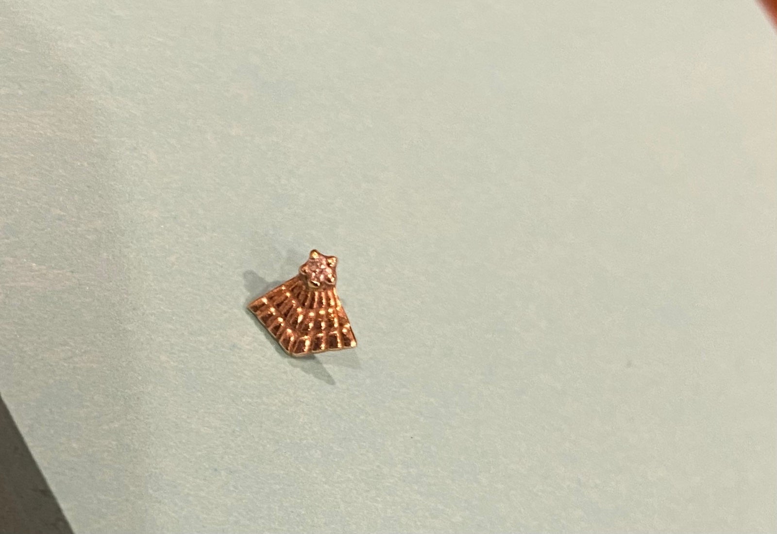 Gold fan earring