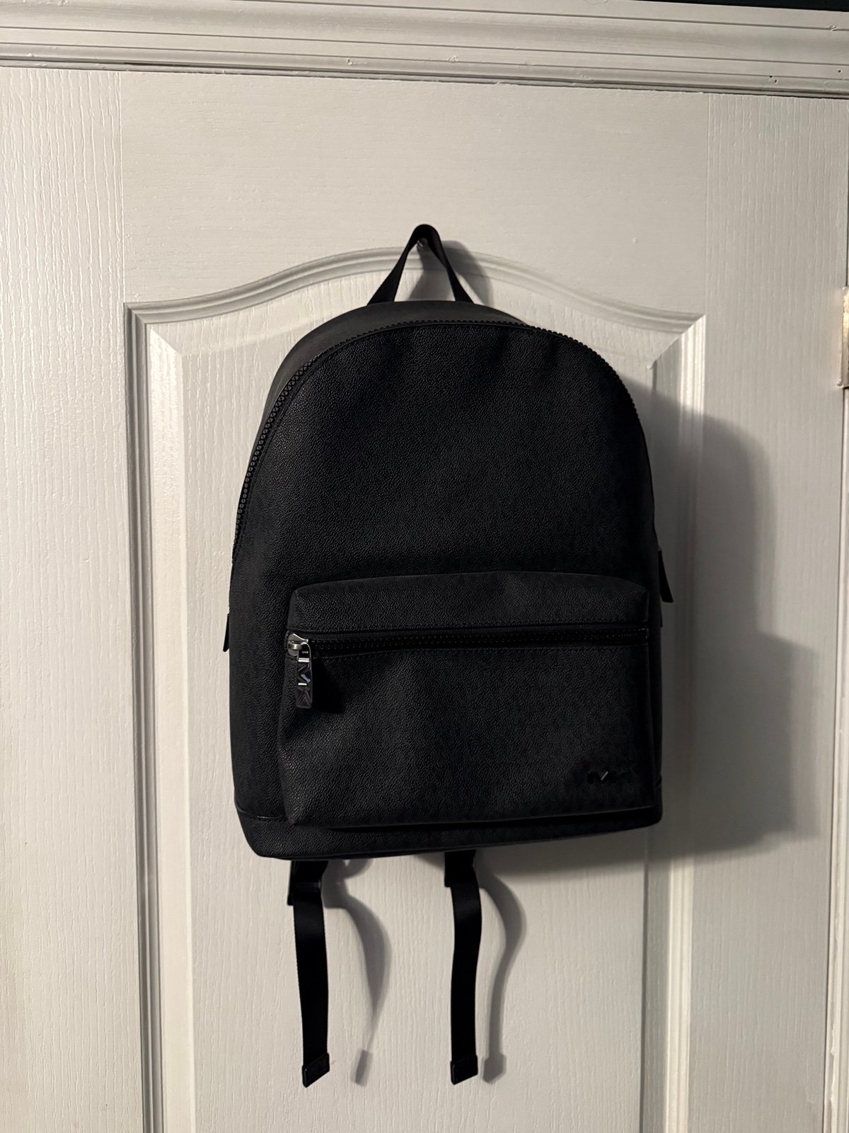 Micheal Kors Black leather Backpack