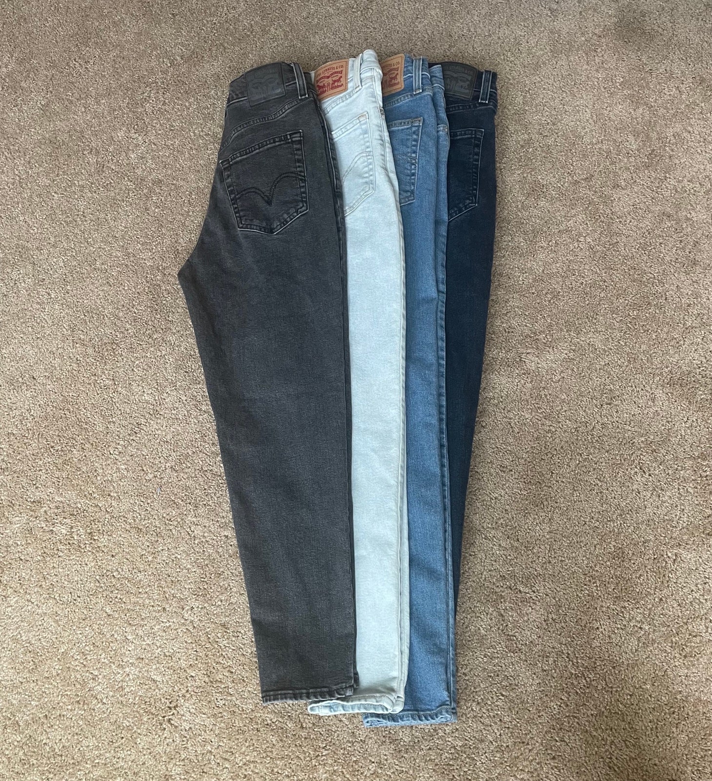 4 Levi’s tapered high waisted jeans