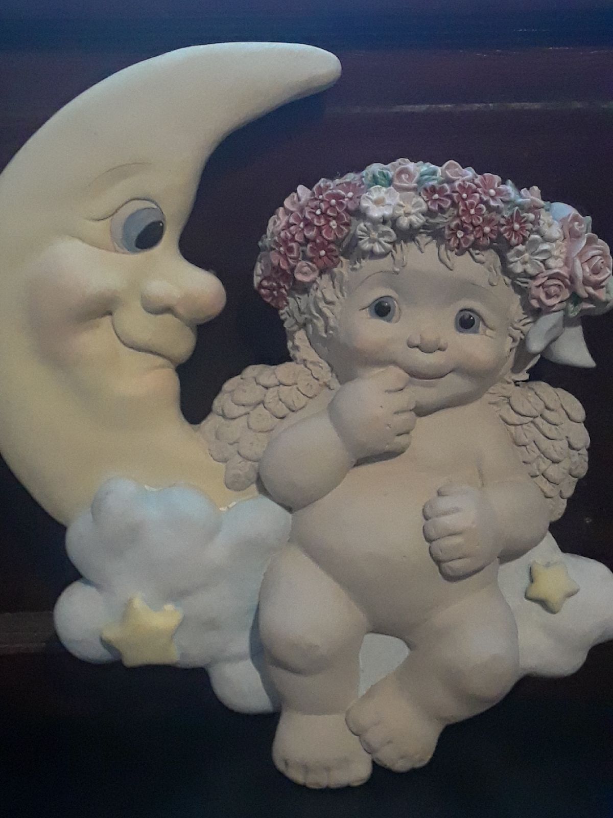 Ceramic cherub and moon