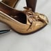 Gucci heels heels pumps metallic gold size 7B